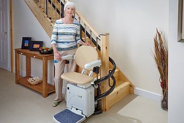 Friendly Stair Lift Chair service technician performing professional stairlift maintenance South Africa