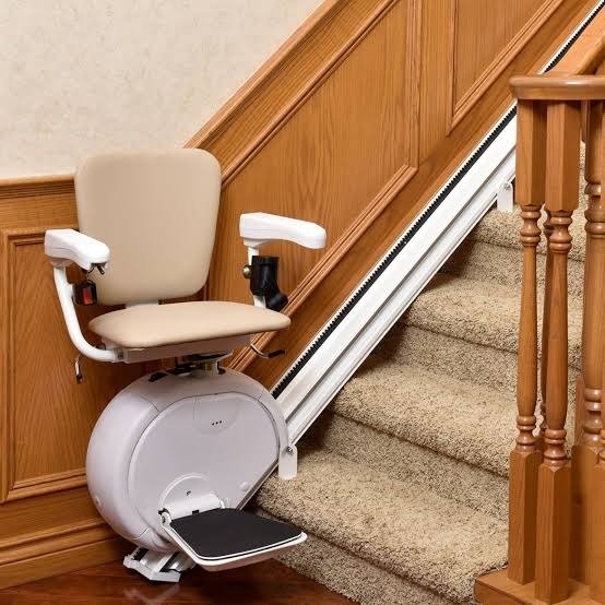 Straight stairlift chair installed on indoor staircase South Africa — Stair Lift Chair
